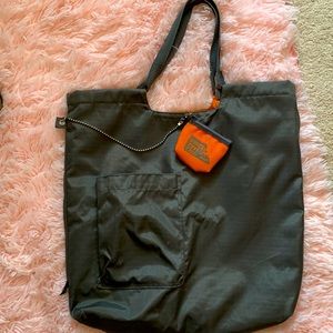 Retro tote bag. 16x16 reversible from solid grey to funky orange graffiti style.